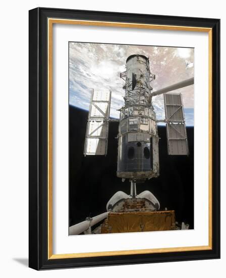 The Hubble Space Telescope Is Released from the Cargo Bay of Space Shuttle Atlantis-null-Framed Photographic Print