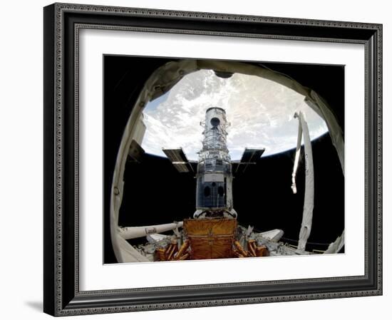 The Hubble Space Telescope, Locked Down in the Cargo Bay of Space Shuttle Atlantis-null-Framed Photographic Print