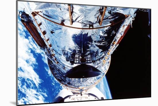 The Hubble Space Telescope Orbiting the Earth, C1990S-null-Mounted Photographic Print