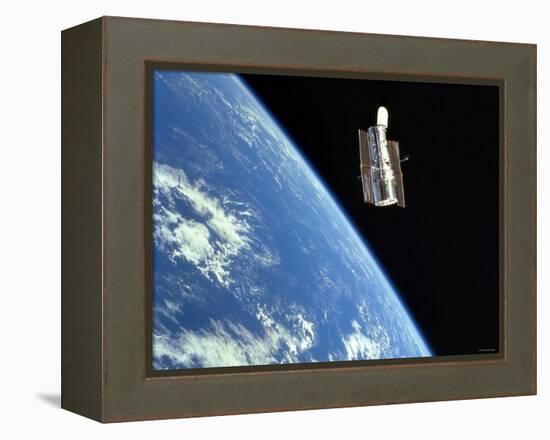 The Hubble Space Telescope with a Blue Earth in the Background-Stocktrek Images-Framed Premier Image Canvas