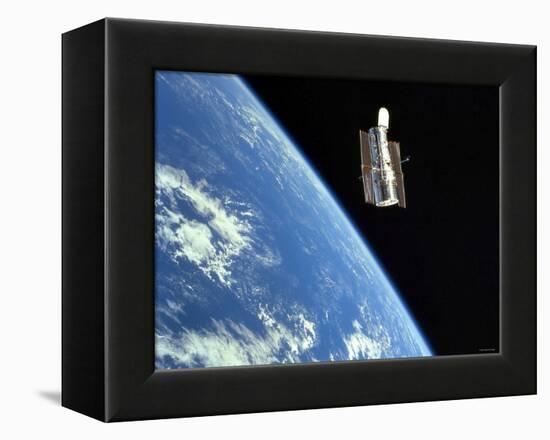 The Hubble Space Telescope with a Blue Earth in the Background-Stocktrek Images-Framed Premier Image Canvas