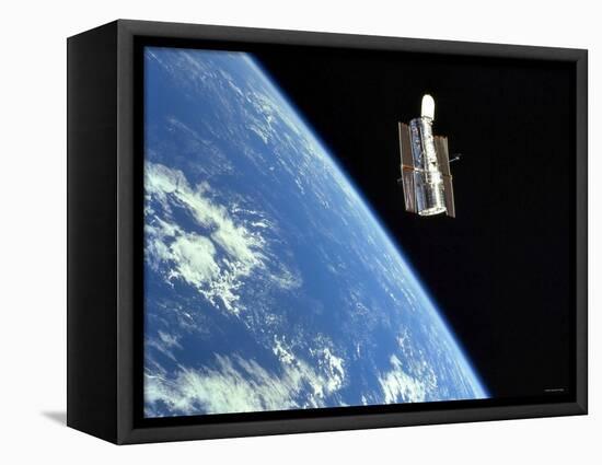 The Hubble Space Telescope with a Blue Earth in the Background-Stocktrek Images-Framed Premier Image Canvas