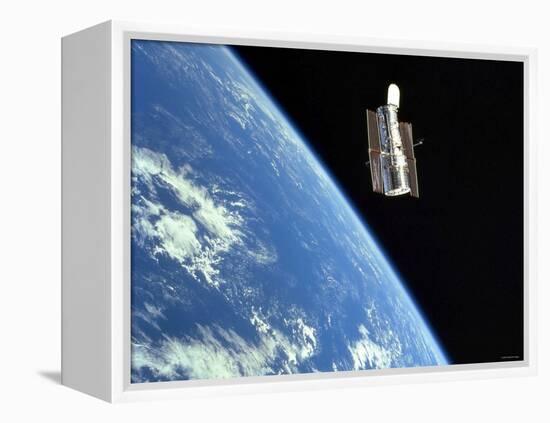 The Hubble Space Telescope with a Blue Earth in the Background-Stocktrek Images-Framed Premier Image Canvas