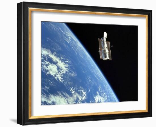 The Hubble Space Telescope with a Blue Earth in the Background-Stocktrek Images-Framed Photographic Print