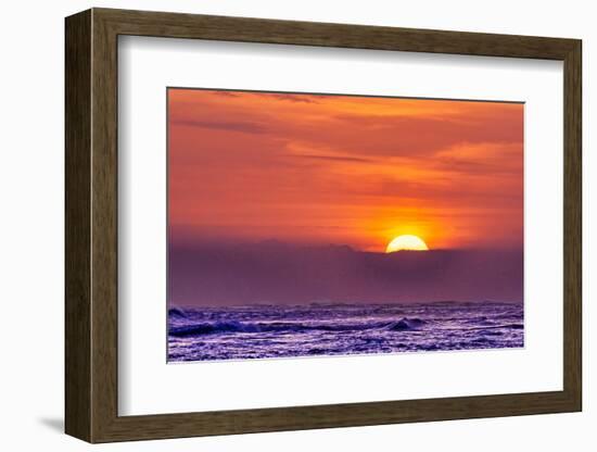 The incredible colors of the setting sun becomes a tourist mecca on the beaches of Bali, Indonesia-Greg Johnston-Framed Photographic Print