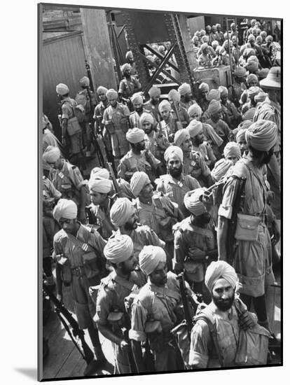 The Indian Sikh Troops from Punjab, Boarding the Troop Transport in the Penang Harbor-Carl Mydans-Mounted Photographic Print