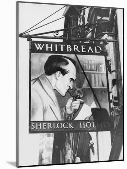 The Inn Sign for 'the Sherlock Holmes' Pub in Baker Street, Central London, England-null-Mounted Photographic Print