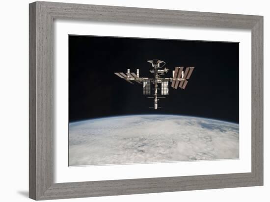 The International Space Station in Orbit Above Earth-null-Framed Photographic Print