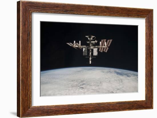 The International Space Station in Orbit Above Earth-null-Framed Photographic Print