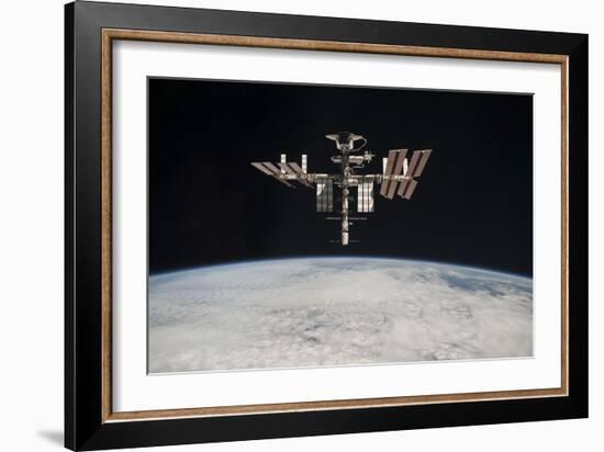 The International Space Station in Orbit Above Earth-null-Framed Photographic Print