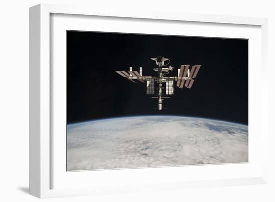 The International Space Station in Orbit Above Earth-null-Framed Photographic Print