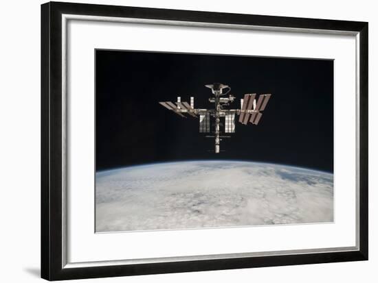 The International Space Station in Orbit Above Earth-null-Framed Photographic Print