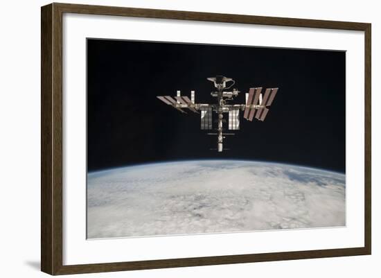 The International Space Station in Orbit Above Earth-null-Framed Photographic Print