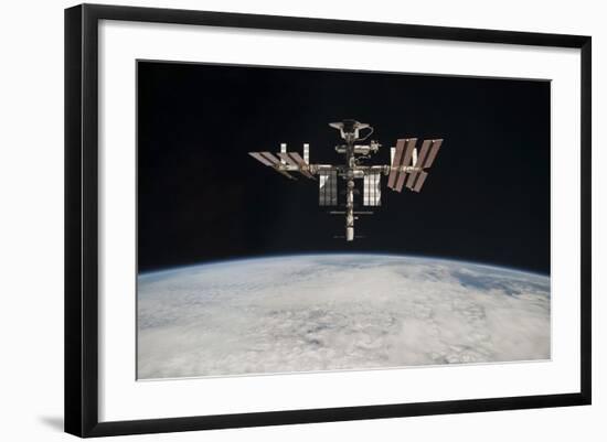 The International Space Station in Orbit Above Earth-null-Framed Photographic Print