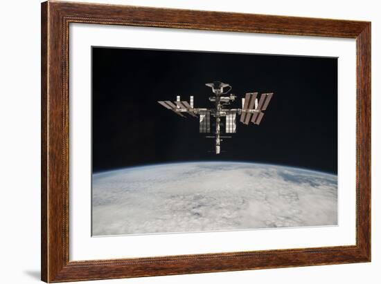 The International Space Station in Orbit Above Earth-null-Framed Photographic Print