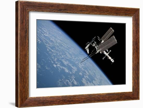 The International Space Station in Orbit Above Earth-null-Framed Photographic Print