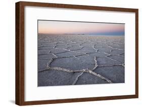 The largest salt flats in the world located in Uyuni, bolivia as the sun is rising in winter.-Mallorie Ostrowitz-Framed Photographic Print
