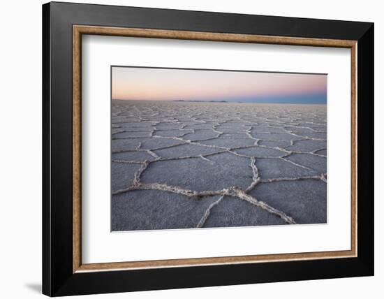 The largest salt flats in the world located in Uyuni, bolivia as the sun is rising in winter.-Mallorie Ostrowitz-Framed Photographic Print