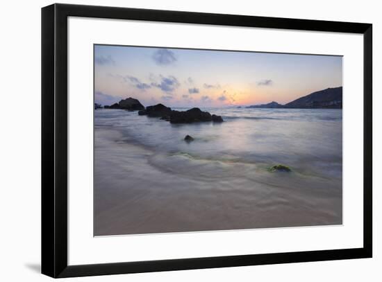 The last lights of the sunset are reflected on sea waves and sandy beach, Licata, Province of Agrig-Roberto Moiola-Framed Photographic Print