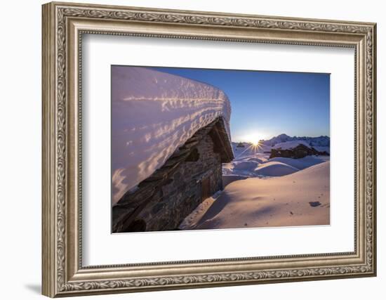 The Last Rays of Sun Light Up the Prabello Alp Chalets Covered with Snow-ClickAlps-Framed Photographic Print