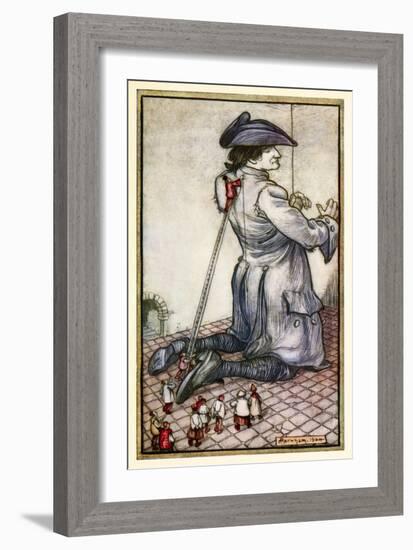 The Lilliputian Tailors Measure Gulliver for a New Suit of Clothes' from 'Part I: A Voyage to Lilli-Arthur Rackham-Framed Giclee Print