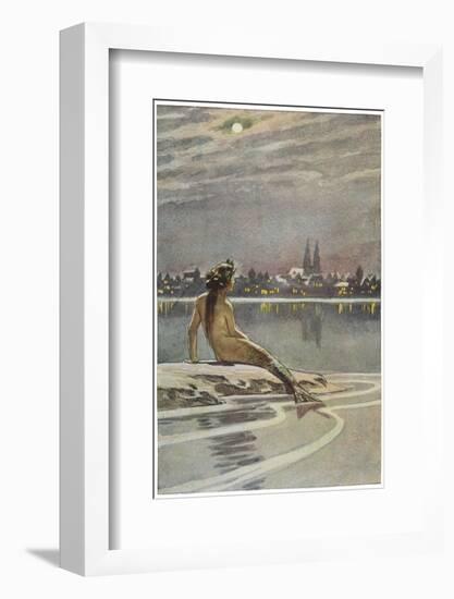 The Little Mermaid Sits on a Rock and Gazes at the Lights of the Distant Town-Paul Hey-Framed Photographic Print
