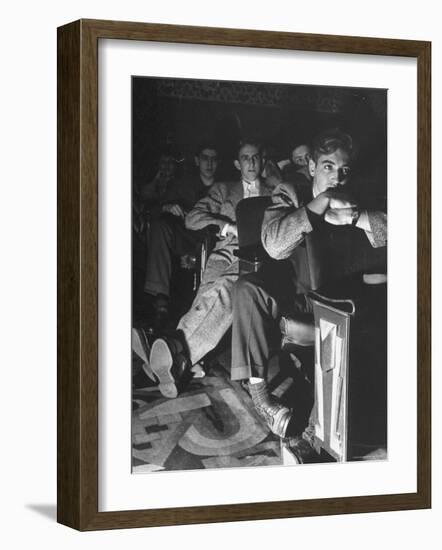 The Local Movie Theater, Boys Have a Very Difficult Time Finding a Place to Put Their Long Legs-Nina Leen-Framed Photographic Print