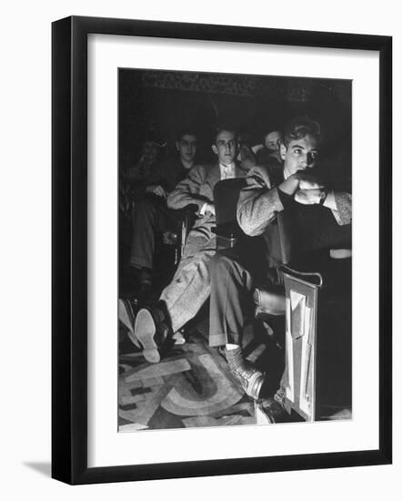 The Local Movie Theater, Boys Have a Very Difficult Time Finding a Place to Put Their Long Legs-Nina Leen-Framed Photographic Print