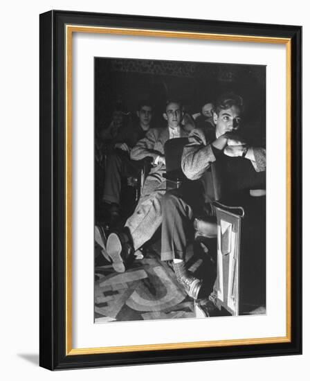 The Local Movie Theater, Boys Have a Very Difficult Time Finding a Place to Put Their Long Legs-Nina Leen-Framed Photographic Print