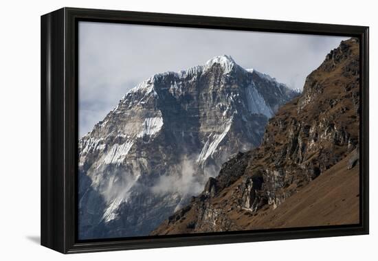The looming face of Jomolhari, the third highest mountain in Bhutan at 7326m, seen from Jangothang,-Alex Treadway-Framed Premier Image Canvas