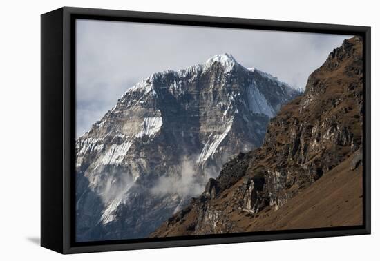 The looming face of Jomolhari, the third highest mountain in Bhutan at 7326m, seen from Jangothang,-Alex Treadway-Framed Premier Image Canvas