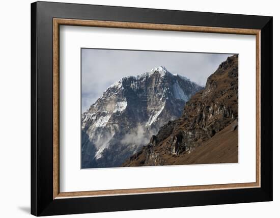 The looming face of Jomolhari, the third highest mountain in Bhutan at 7326m, seen from Jangothang,-Alex Treadway-Framed Photographic Print