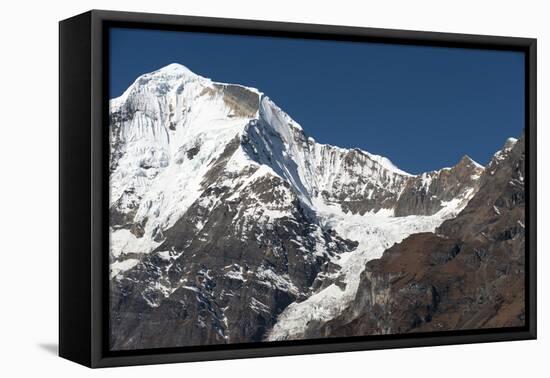 The looming face of Jomolhari, third highest mountain in Bhutan at 7326m, seen from Jangothang, Thi-Alex Treadway-Framed Premier Image Canvas