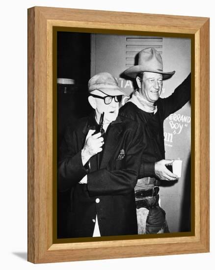 THE MAN WHO SHOT LIBERTY VALANCE, 1962 directed by JOHN FORD On the set, John Ford with John Wayne -null-Framed Stretched Canvas