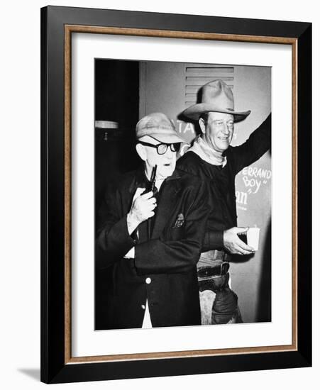 THE MAN WHO SHOT LIBERTY VALANCE, 1962 directed by JOHN FORD On the set, John Ford with John Wayne -null-Framed Photo