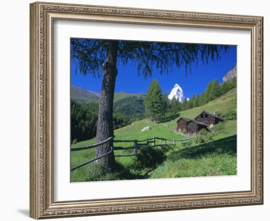 The Matterhorn Towering Above Green Pastures and Wooden Huts, Swiss Alps, Switzerland-Ruth Tomlinson-Framed Photographic Print