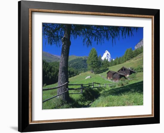 The Matterhorn Towering Above Green Pastures and Wooden Huts, Swiss Alps, Switzerland-Ruth Tomlinson-Framed Photographic Print