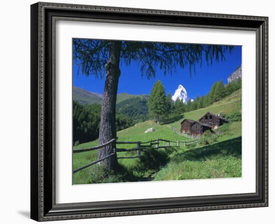 The Matterhorn Towering Above Green Pastures and Wooden Huts, Swiss Alps, Switzerland-Ruth Tomlinson-Framed Photographic Print