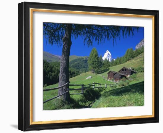 The Matterhorn Towering Above Green Pastures and Wooden Huts, Swiss Alps, Switzerland-Ruth Tomlinson-Framed Photographic Print