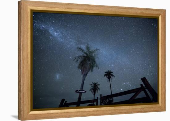 The Milky Way Above Palm Trees and a Wooden Farm Gate-Alex Saberi-Framed Premier Image Canvas