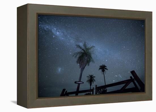 The Milky Way Above Palm Trees and a Wooden Farm Gate-Alex Saberi-Framed Premier Image Canvas