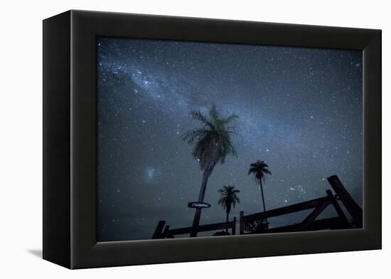 The Milky Way Above Palm Trees and a Wooden Farm Gate-Alex Saberi-Framed Premier Image Canvas