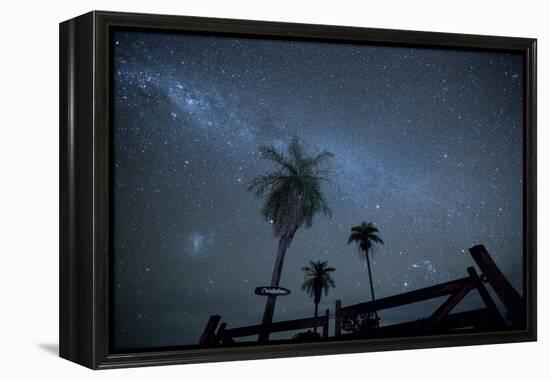 The Milky Way Above Palm Trees and a Wooden Farm Gate-Alex Saberi-Framed Premier Image Canvas