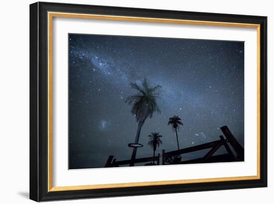 The Milky Way Above Palm Trees and a Wooden Farm Gate-Alex Saberi-Framed Photographic Print