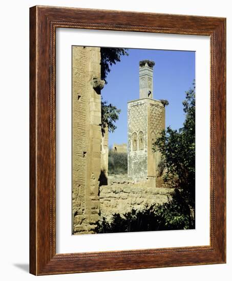 The minaret of one of the two mosques which lie inside the Chellah Necropolis-Werner Forman-Framed Giclee Print