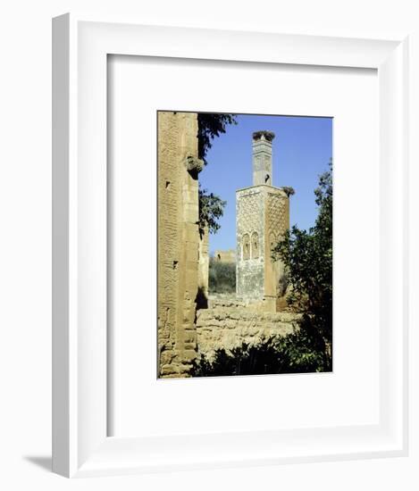 The minaret of one of the two mosques which lie inside the Chellah Necropolis-Werner Forman-Framed Giclee Print