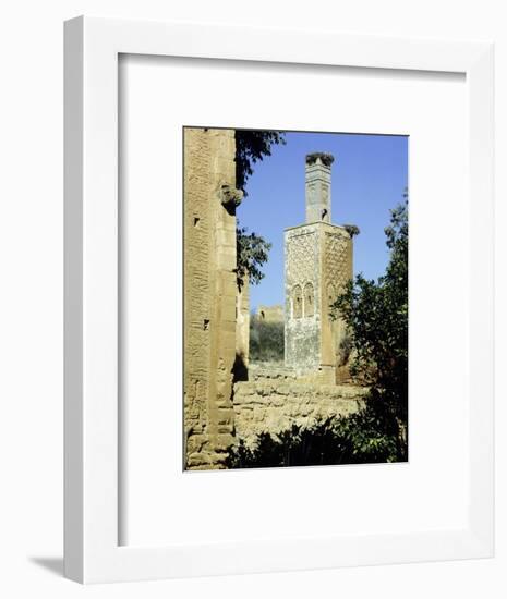 The minaret of one of the two mosques which lie inside the Chellah Necropolis-Werner Forman-Framed Giclee Print