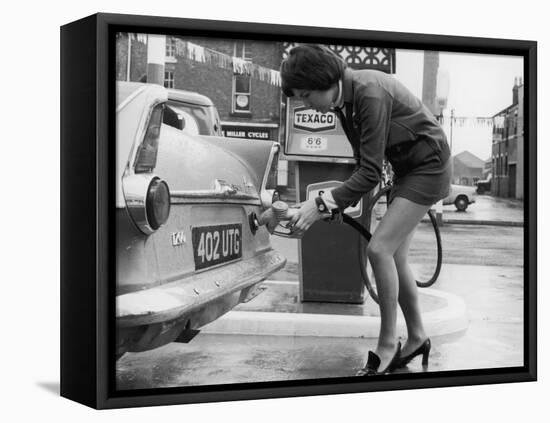 The Modern Female Petrol Pump Operator Refuelling a Car in Her Mini Skirt-null-Framed Premier Image Canvas