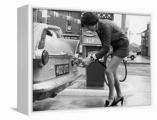 The Modern Female Petrol Pump Operator Refuelling a Car in Her Mini Skirt-null-Framed Premier Image Canvas