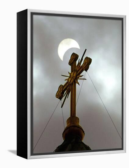 The Moon Partially Covers the Sun During a Partial Solar Eclipse-null-Framed Premier Image Canvas